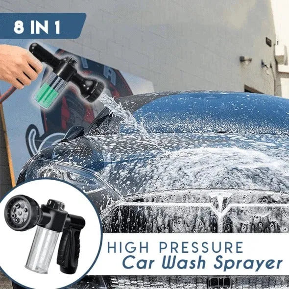 Green high-pressure foam spray gun with adjustable nozzle and attached water hose for car and garden cleaning.