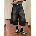 Men's loose straight denim shorts in blue colour showing five-part pants length design