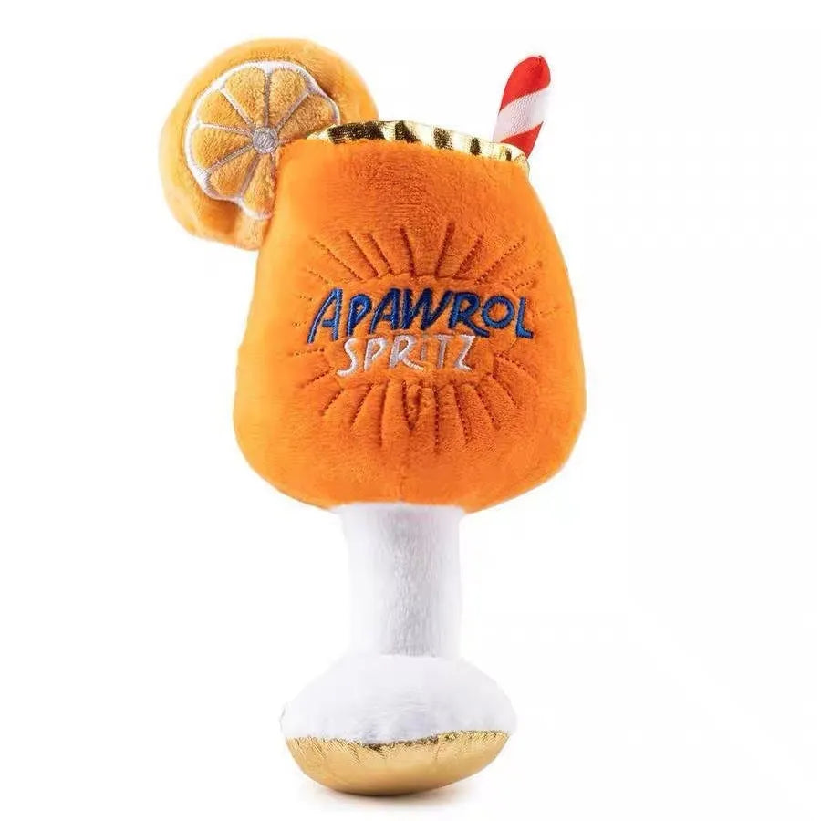 Yellow beer bottle shaped plush dog chew toy with textured surface and squeaker mechanism