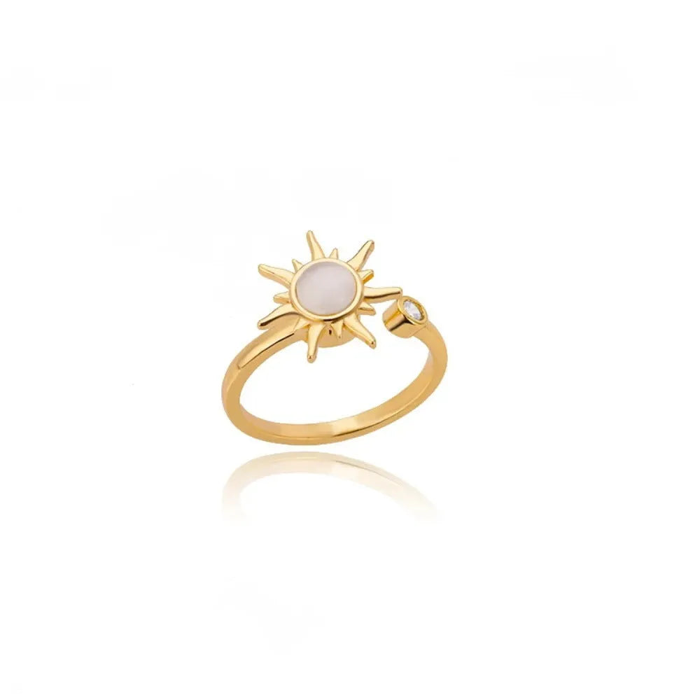 Gold and platinum electroplated copper rotatable ring with adjustable open mouth and geometric round shape