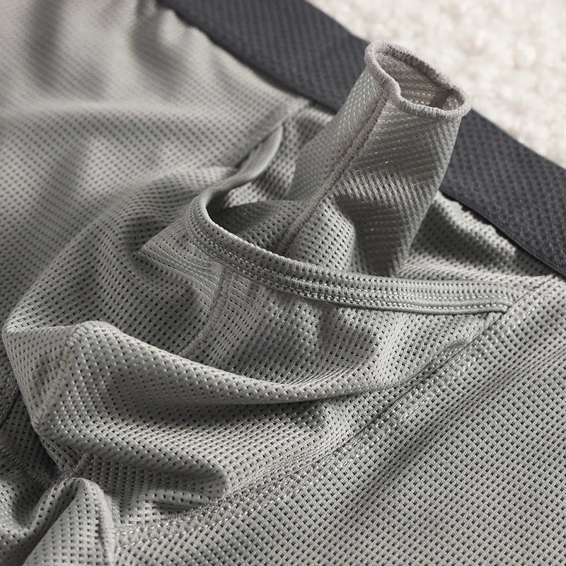 Men's Ice Silk boxer underwear in solid colour with breathable mesh fabric and low waist design
