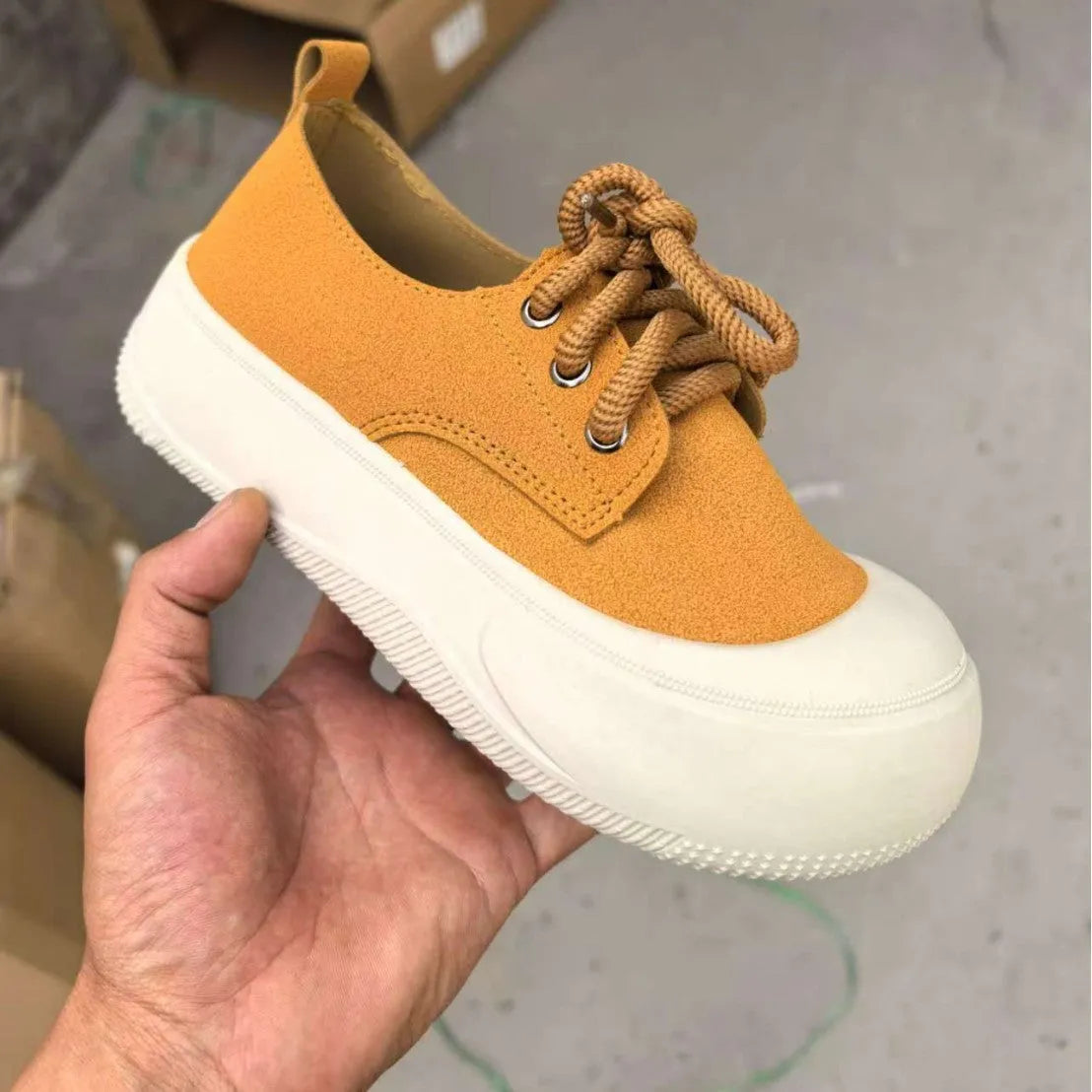 Women's suede platform loafers with 4cm height increase, round toe, and front lace-up design in beige, black, and camel.