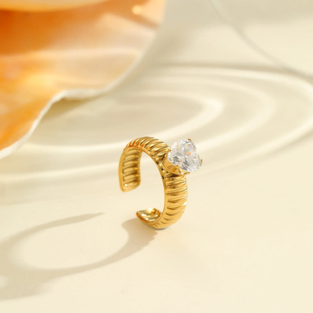 Gold electroplated stainless steel ring with zircon geometric design on adjustable open mouth band