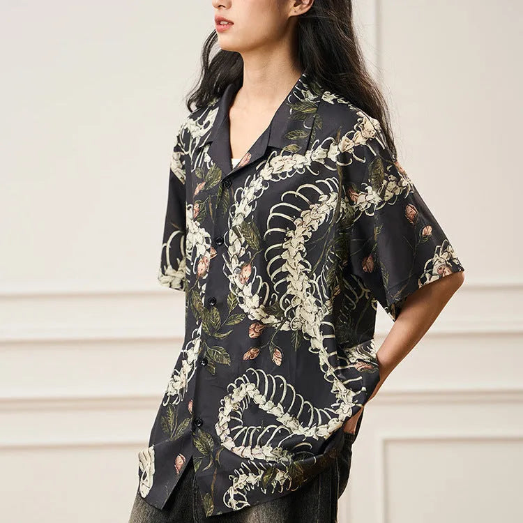 Short sleeve Cuban collar shirt with printed snake bone floral pattern in loose fit.