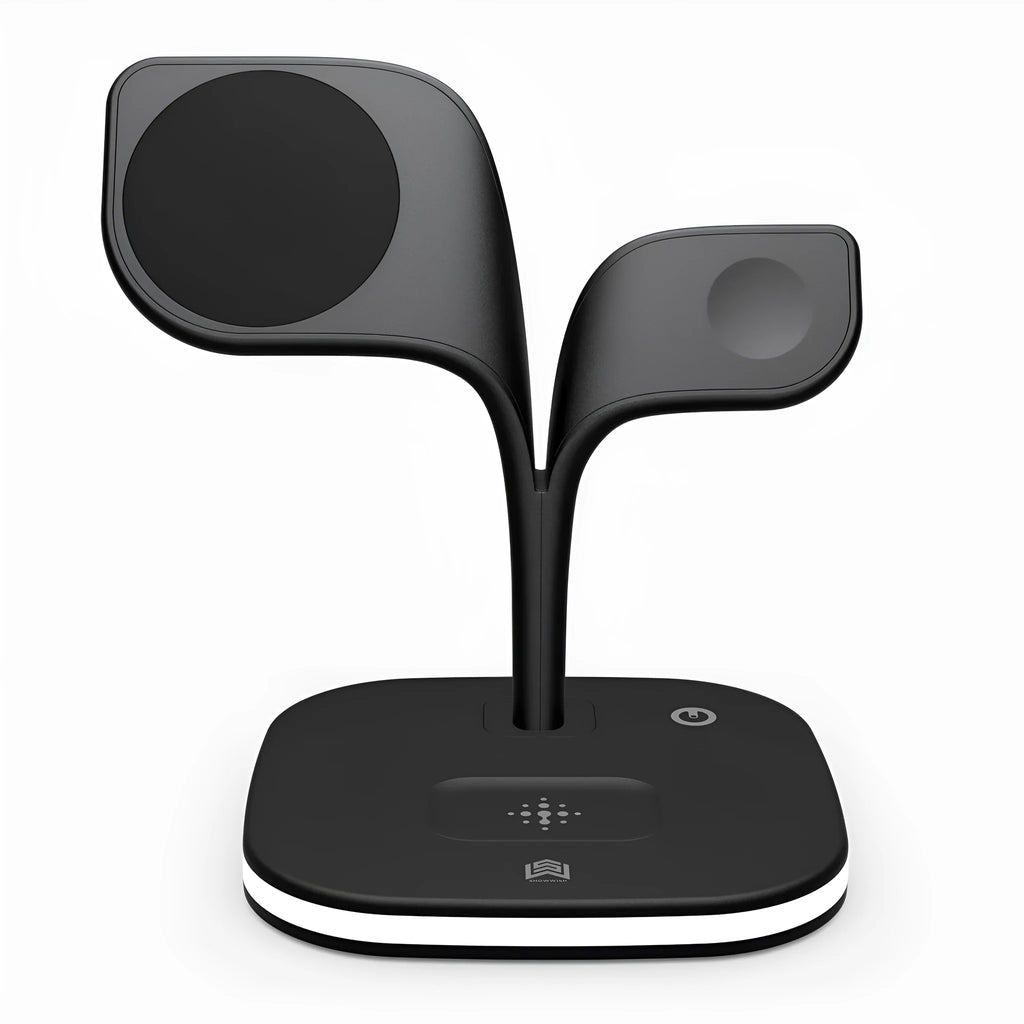 Black 3-in-1 wireless charging stand holding a mobile phone, a smartwatch, and headphones on a desk.