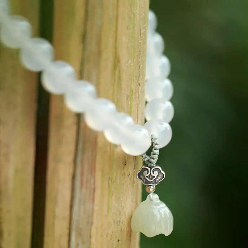 Women's bracelet with S925 silver and white agate Hetian jade beads in geometric lotus pattern