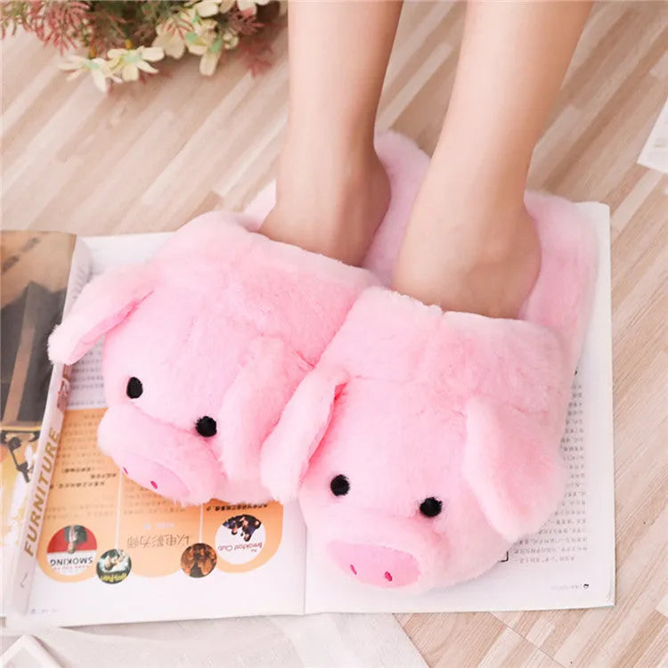 Pink pig-themed plush floor slippers with soft short fabric and cotton filling.