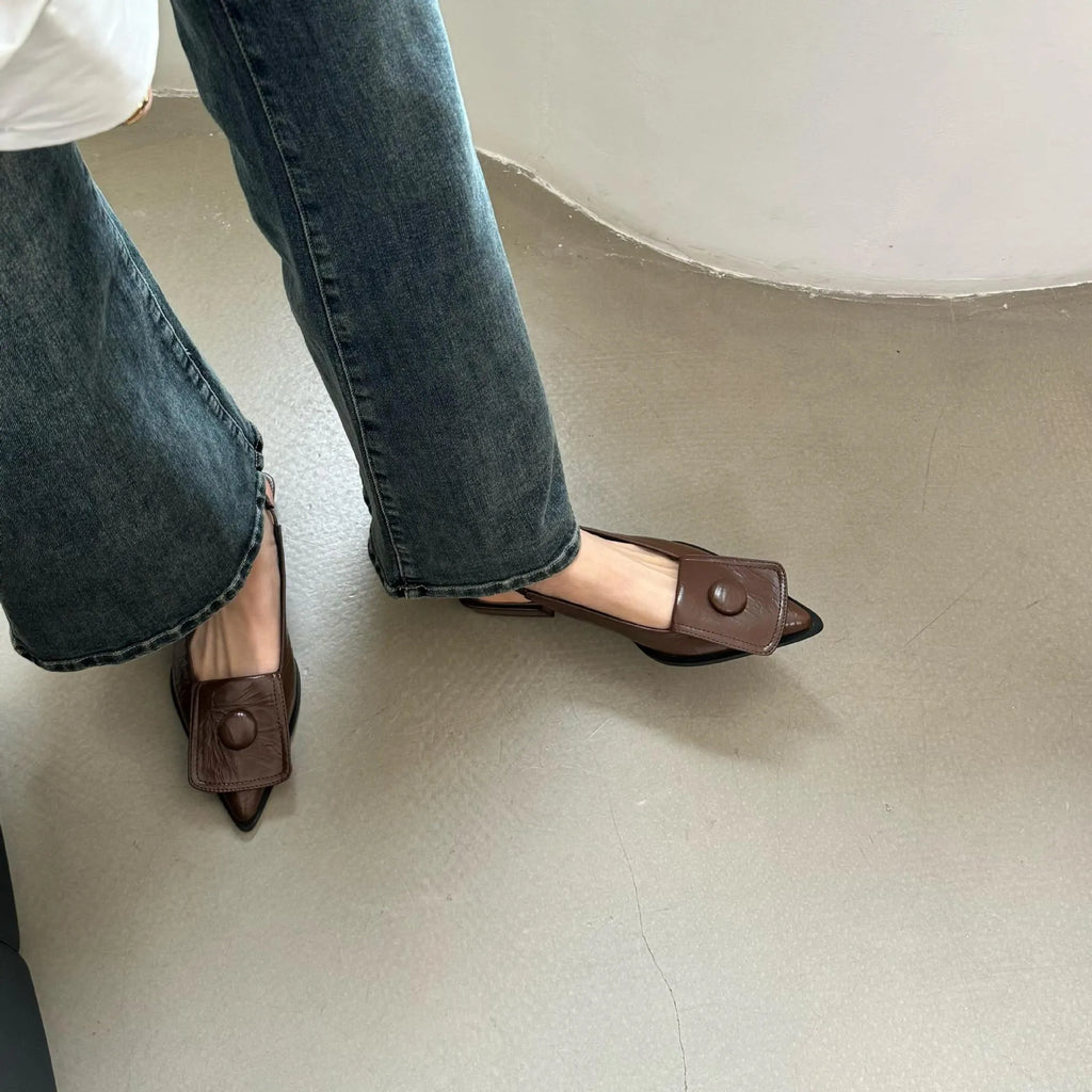 Women's low heel pointed toe sandals in apricot with a back strap and closed toe design.