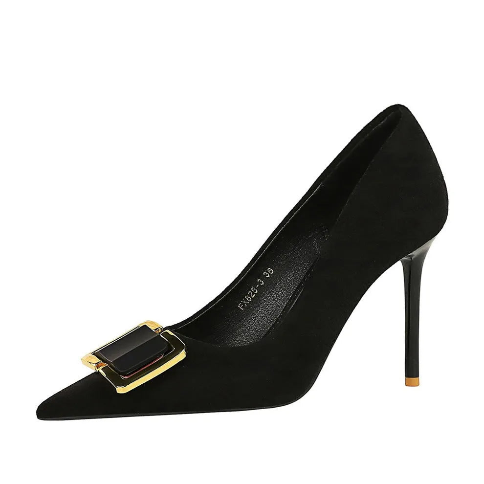 Black suede women's stiletto high heels with a pointed toe and 9cm heel on a rubber sole.
