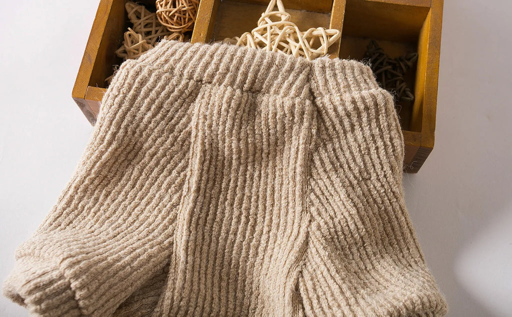 Brown cloth pullover sweater on small dog showing casual style and size fit