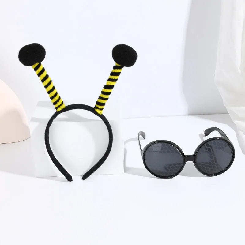 Yellow and red bee costume headband and matching black frame glasses for children's dress-up.