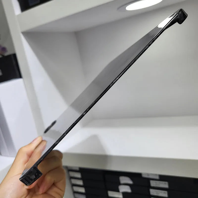 Apple iPad Pro 11 hard case made of black carbon fibre with an embossed plaid pattern.