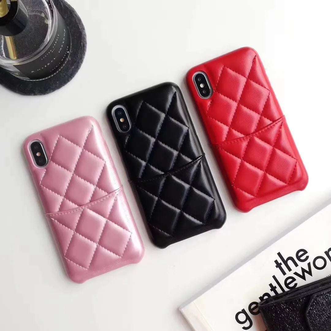 Black leather mobile phone case for iPhone XS Max on a table