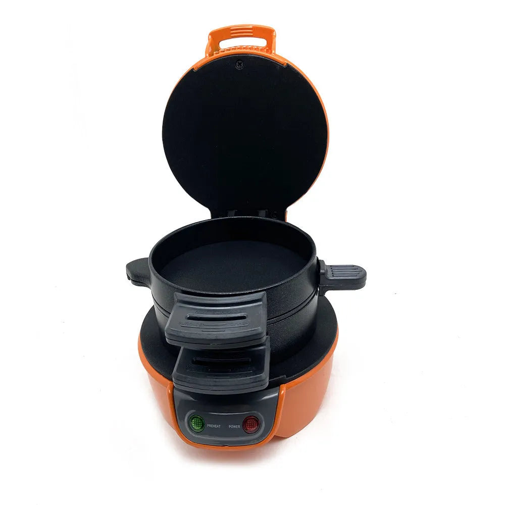 Bright red household breakfast machine with sandwich plates and egg cooking ring on kitchen counter