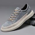 Men's grey casual pigskin skate shoes with rubber sole and round toe design