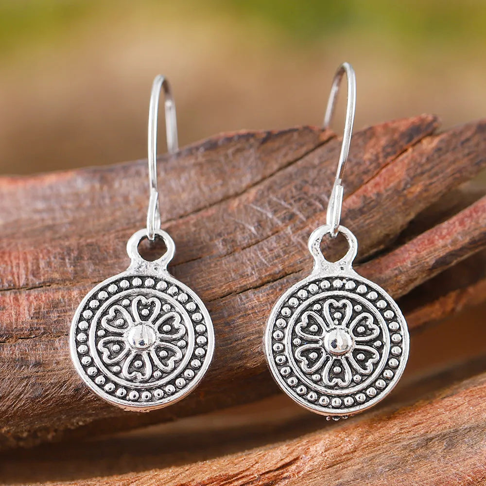 Bohemian style retro earrings with geometric shape and distressed ethnic design in zinc alloy