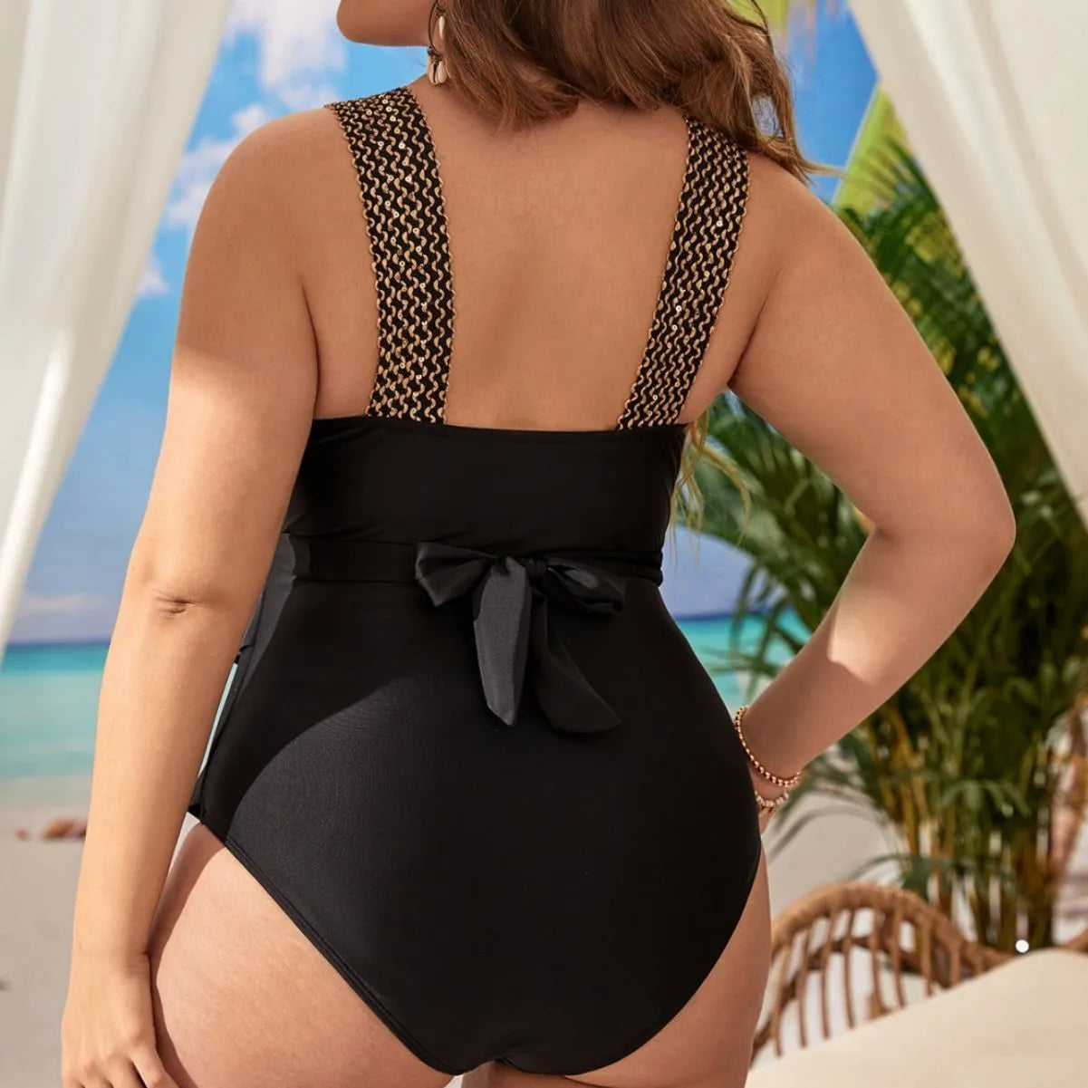 Women's black one-piece sleeveless swimsuit with chest pad on a mannequin.