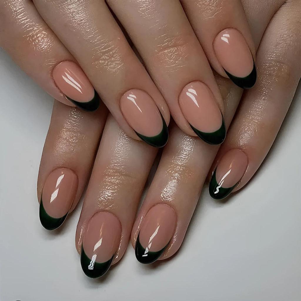 24 artificial press-on nails showing short almond shape with matte black French manicure design