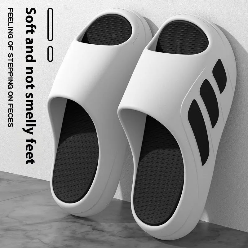 Brown platform slippers with a thick EVA sole and flip-flop design for indoor use.