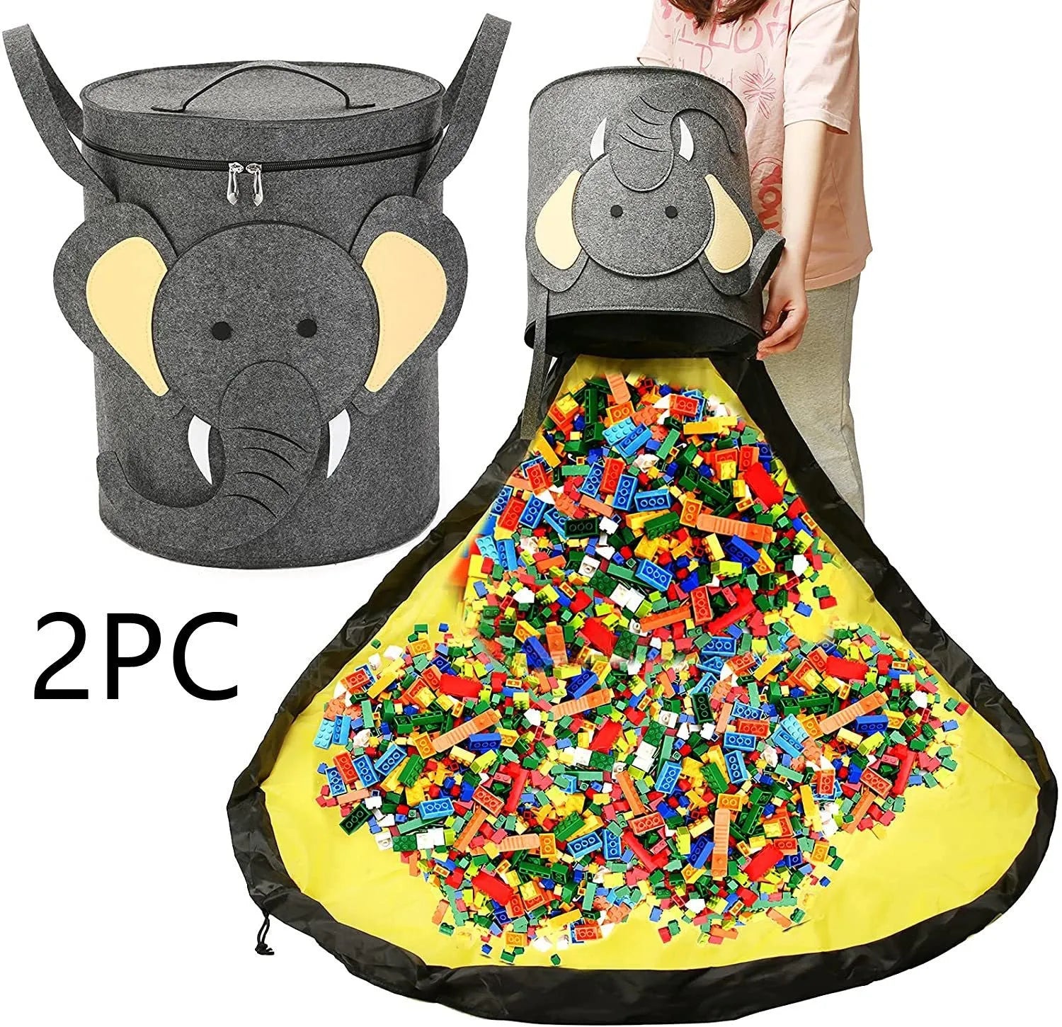 Green felt cube storage bag open showing toys inside, laying flat as play mat