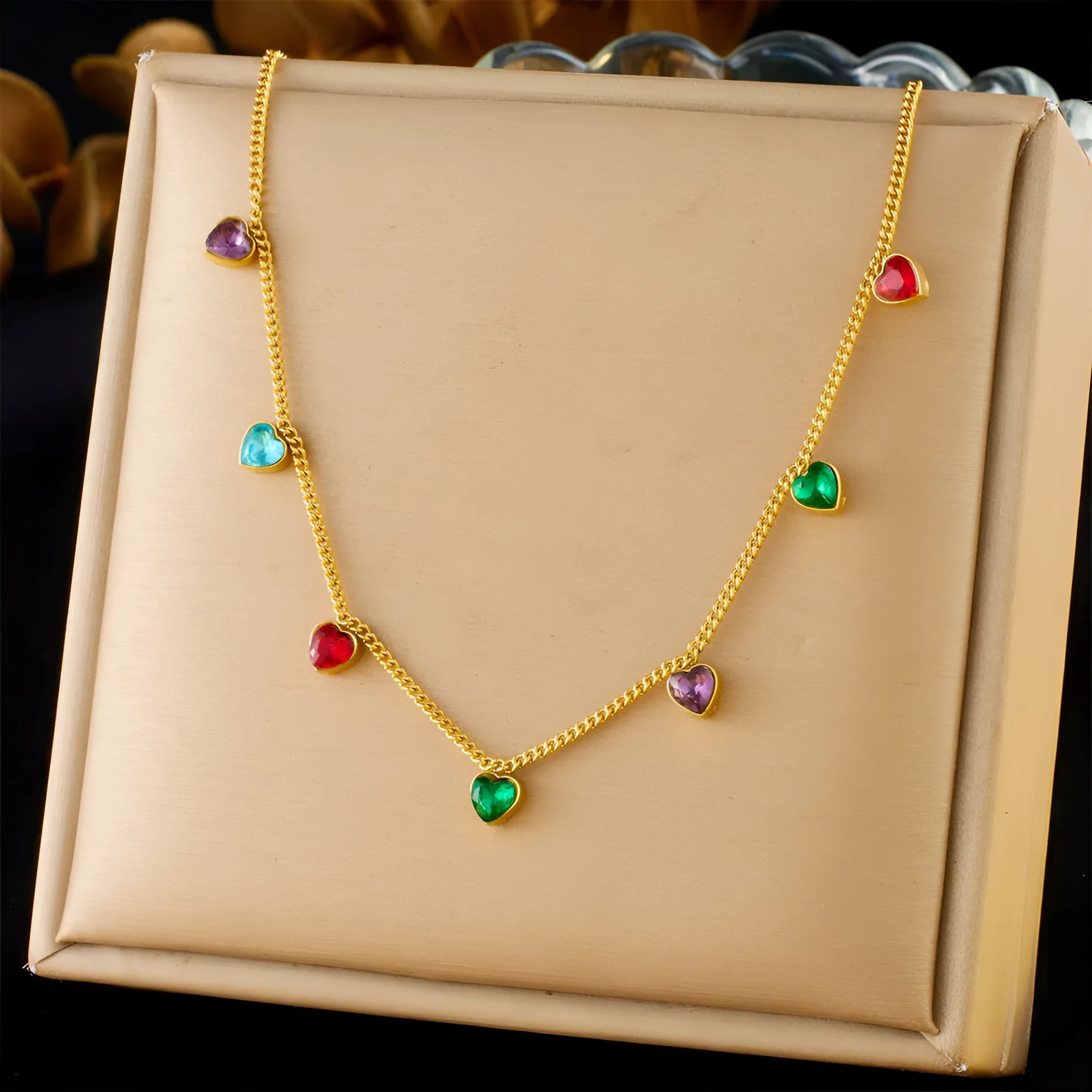 Gold-coloured heart pendant necklace on a stainless steel chain for women.