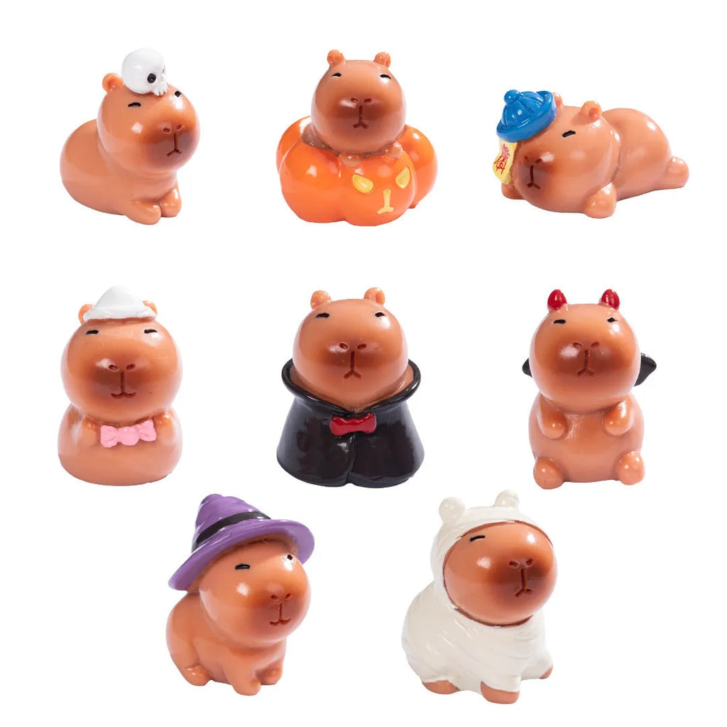Eight Halloween capybara resin decorations showing pumpkin, zombie, ghost, mummy, vampire, witch hat, devil and skull designs