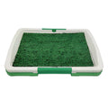 Green artificial grass dog toilet patch measuring 69cm square with three-layer construction for indoor pet training