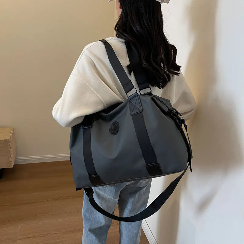 Waterproof Oxford cloth travel bag with dry-wet separation compartments and spine protection in solid colour options