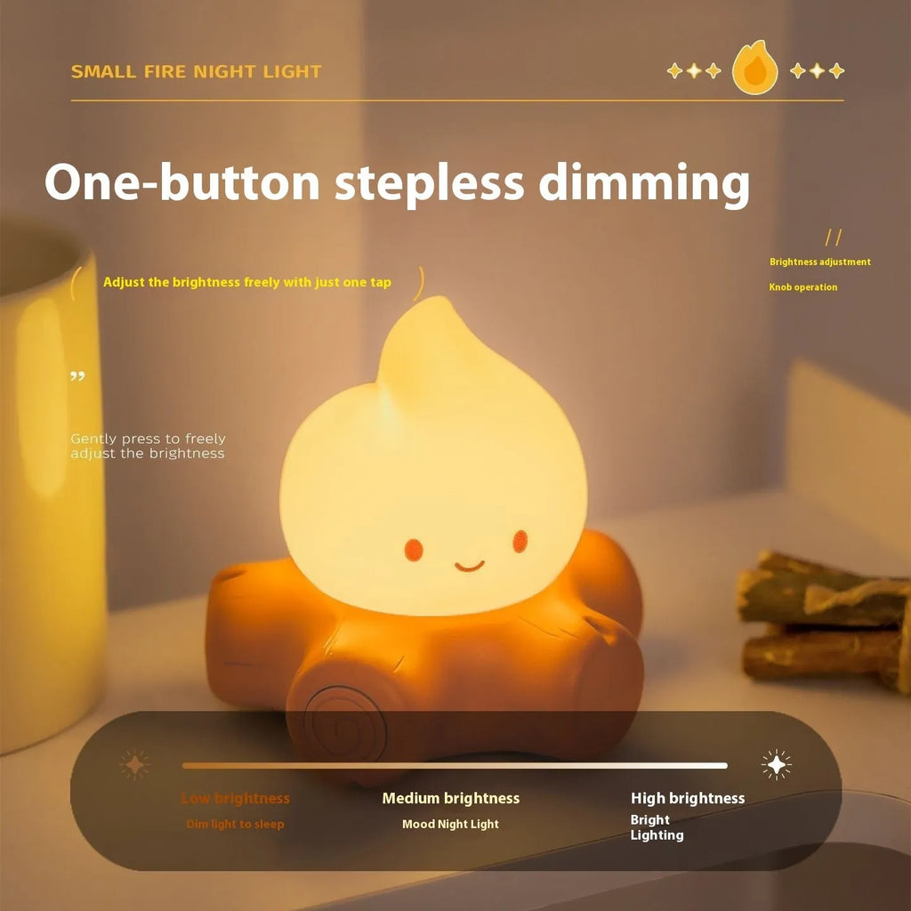 Silicone small fire pile cartoon night light with ABS shade showing warm yellow illumination