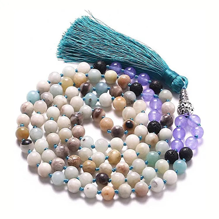 Long multi-stone agate and amethyst tassel necklace with blue pattern, geometric beads.