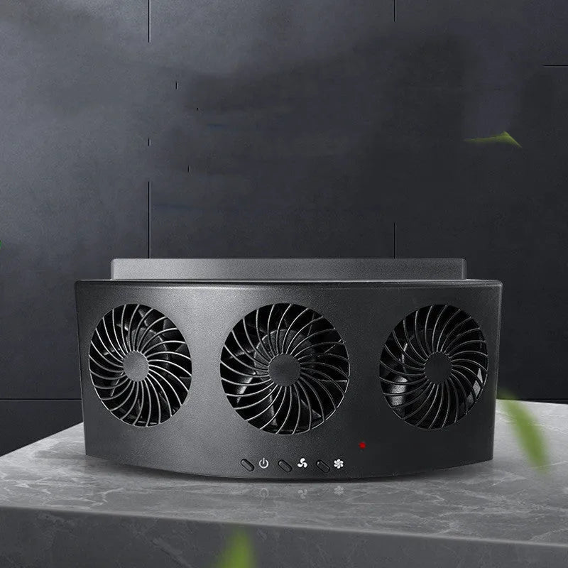 Black and white USB-powered car ventilation fan on a car dashboard