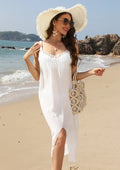 White suspender beach dress with woven crochet detail and a bottom slit.