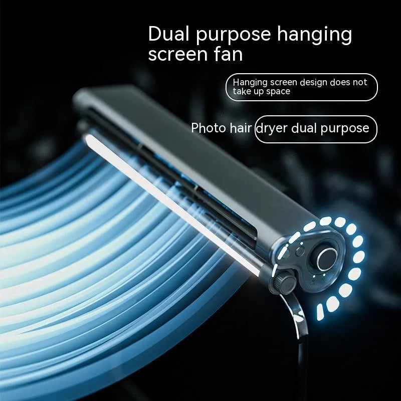 Black clip-on bladeless USB fan with LED lighting mounted on laptop screen showing compact design