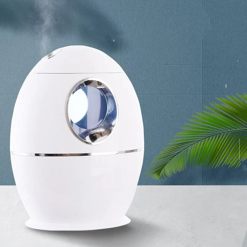 White columnar household air disinfection humidifier with USB cable on a table