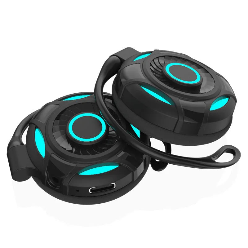 Black wireless Bluetooth earphones with hanging ear design showing USB charging port