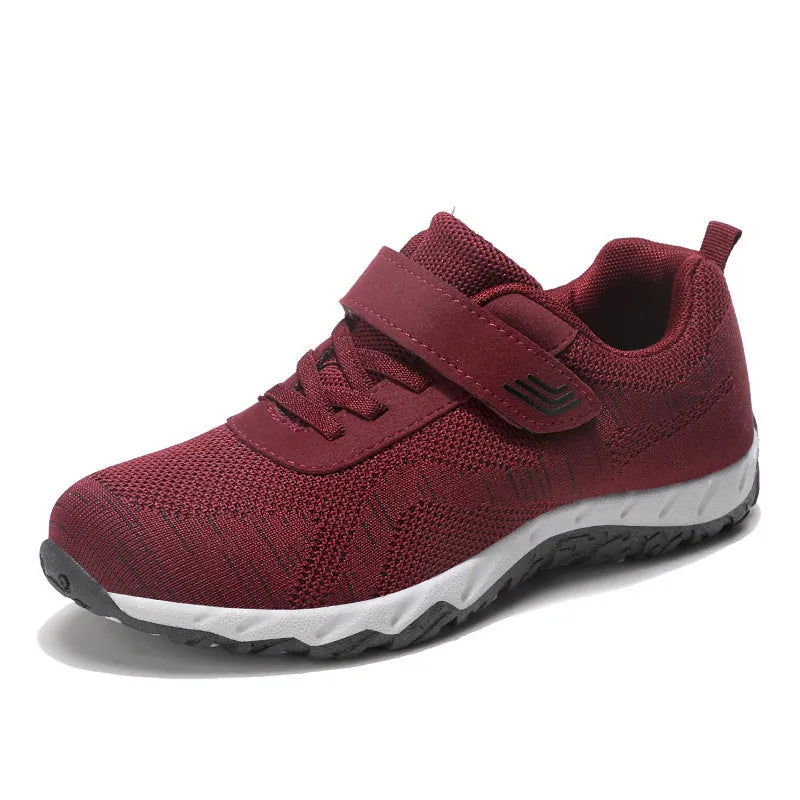 Women's grey purple wedge heel shoes with mesh upper and Velcro strap fastener.