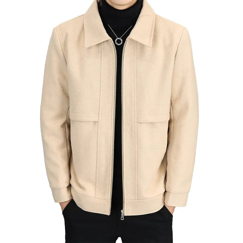 Man wearing a khaki polo collar casual jacket with side seam pockets.