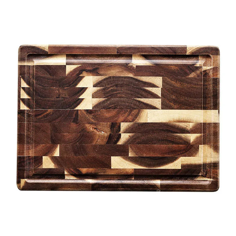 Brown acacia solid wood parquet cutting board with 3cm thickness on a kitchen counter.