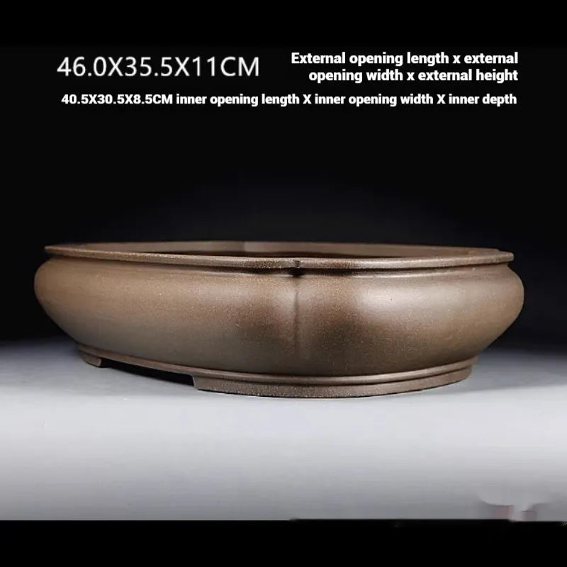 Handmade antique purple clay papaya-shaped flower pot measuring 46cm long