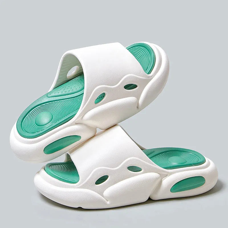 Women's two-colour EVA slippers with thick sole and leather lining in pink purple, shown on a foot.