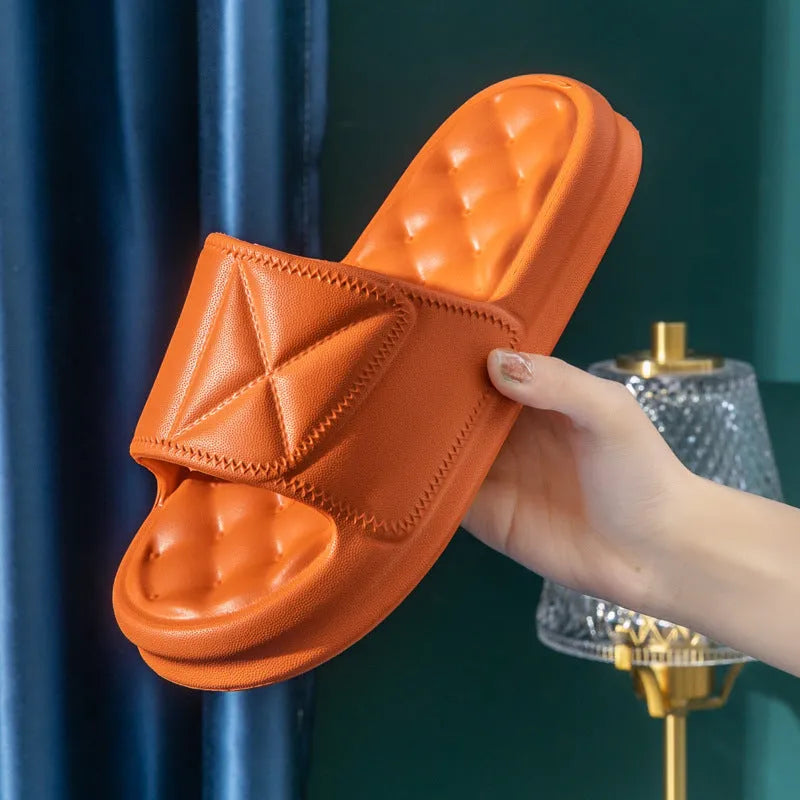 EVA bathroom slippers with 3.5cm sole in various colours on bathroom floor
