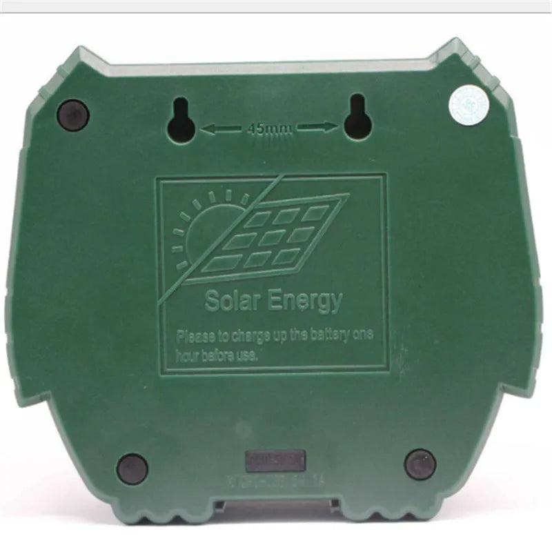 Green solar-powered ultrasonic animal repeller with motion sensor on a white background.