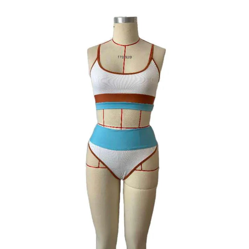 Women's solid colour quick-dry bikini set with top and shorts in one of seven colour options.