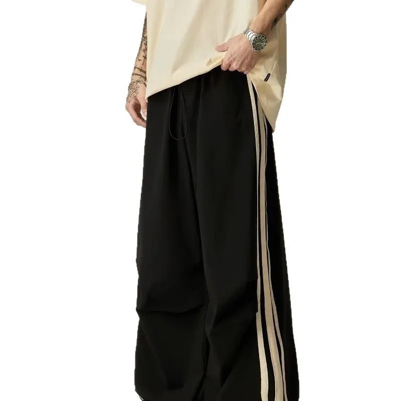 Men's black wide-leg climbing trousers with high waist and straight leg design