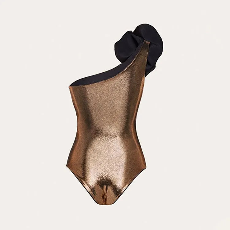 Gold coloured one-piece halterneck swimsuit with hollow-out details on a mannequin.