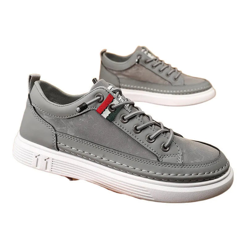 Men's casual high-top sneakers in grey with round toe and PVC sole.