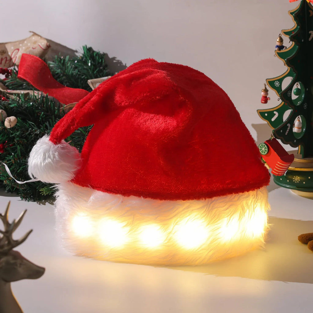 Red and white plush LED Santa hat with twinkling lights and pom-pom decoration