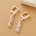 Rectangular hollow stud earrings with two-tone electroplated finish and geometric design