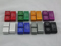 Three-piece metal car fastening clamp for cables and hoses in six colour options.