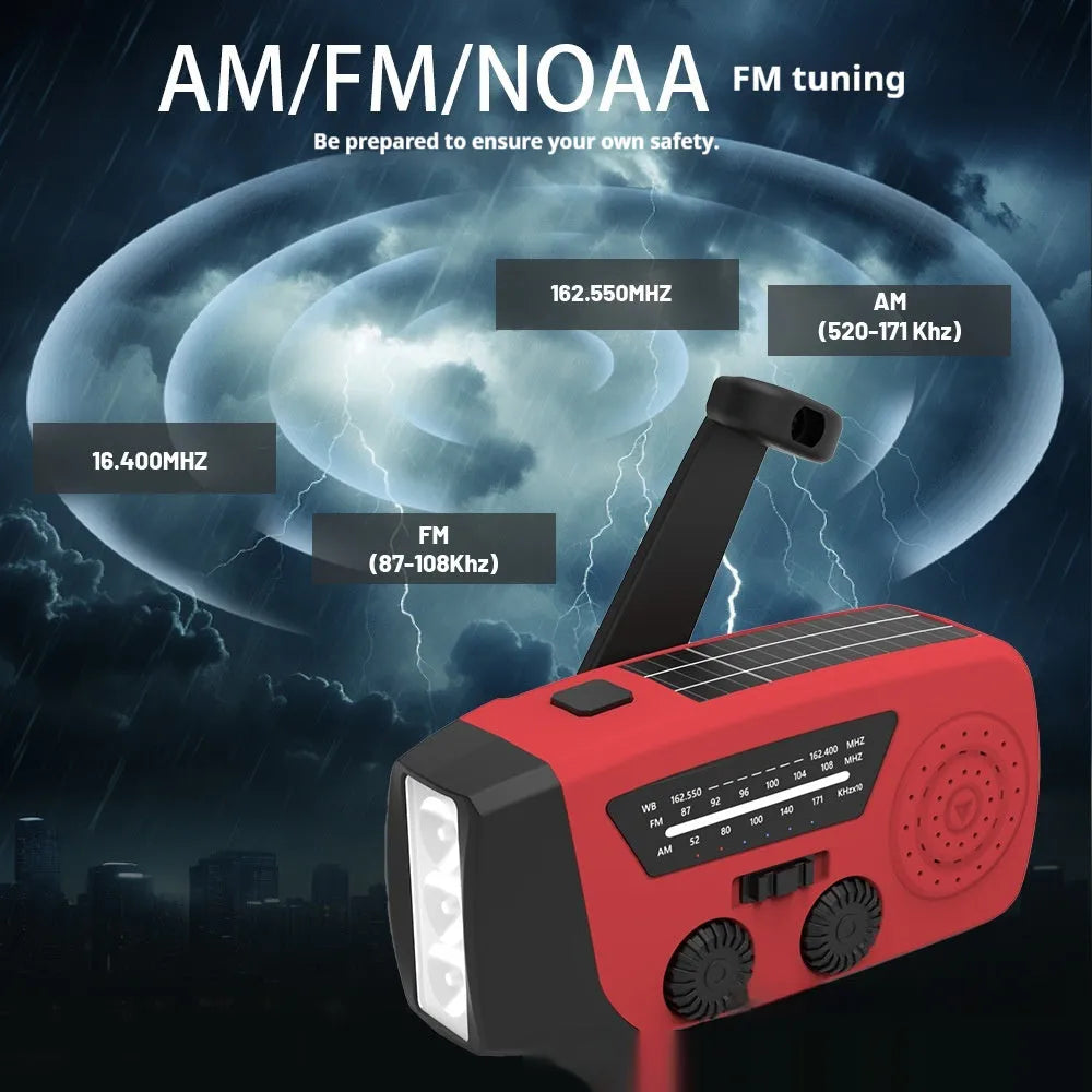 Red rechargeable emergency hand radio with torch, hand crank, and wrist strap on a white background.